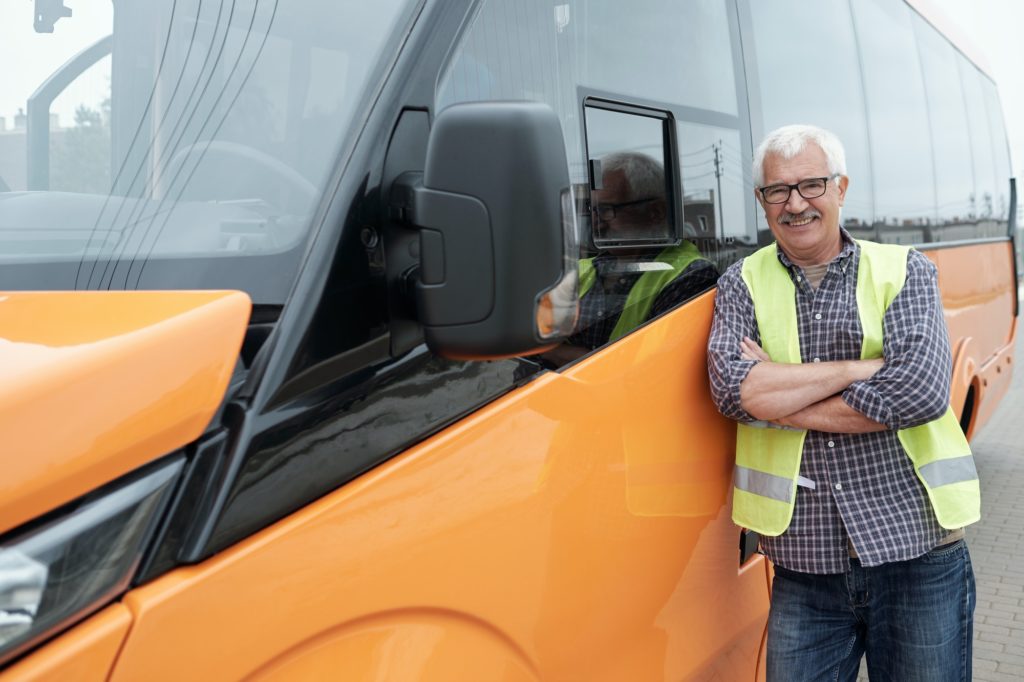 Portrait of Smiling Bus Driver